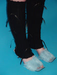 Black leg warmers with ribbons